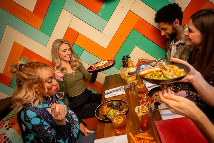 Group of friends sharing food